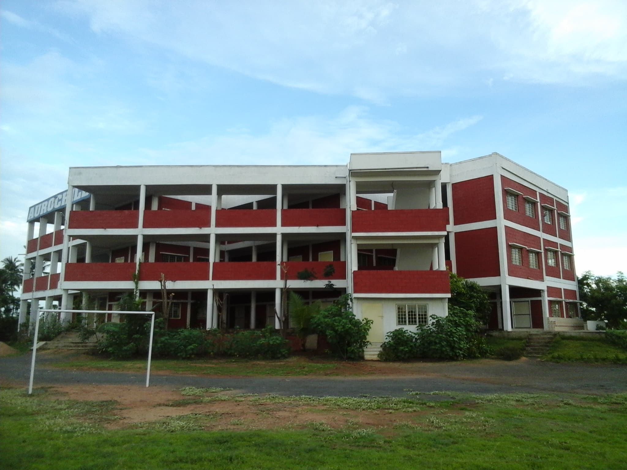 Wide view of the Aurochild campus building and open grounds
