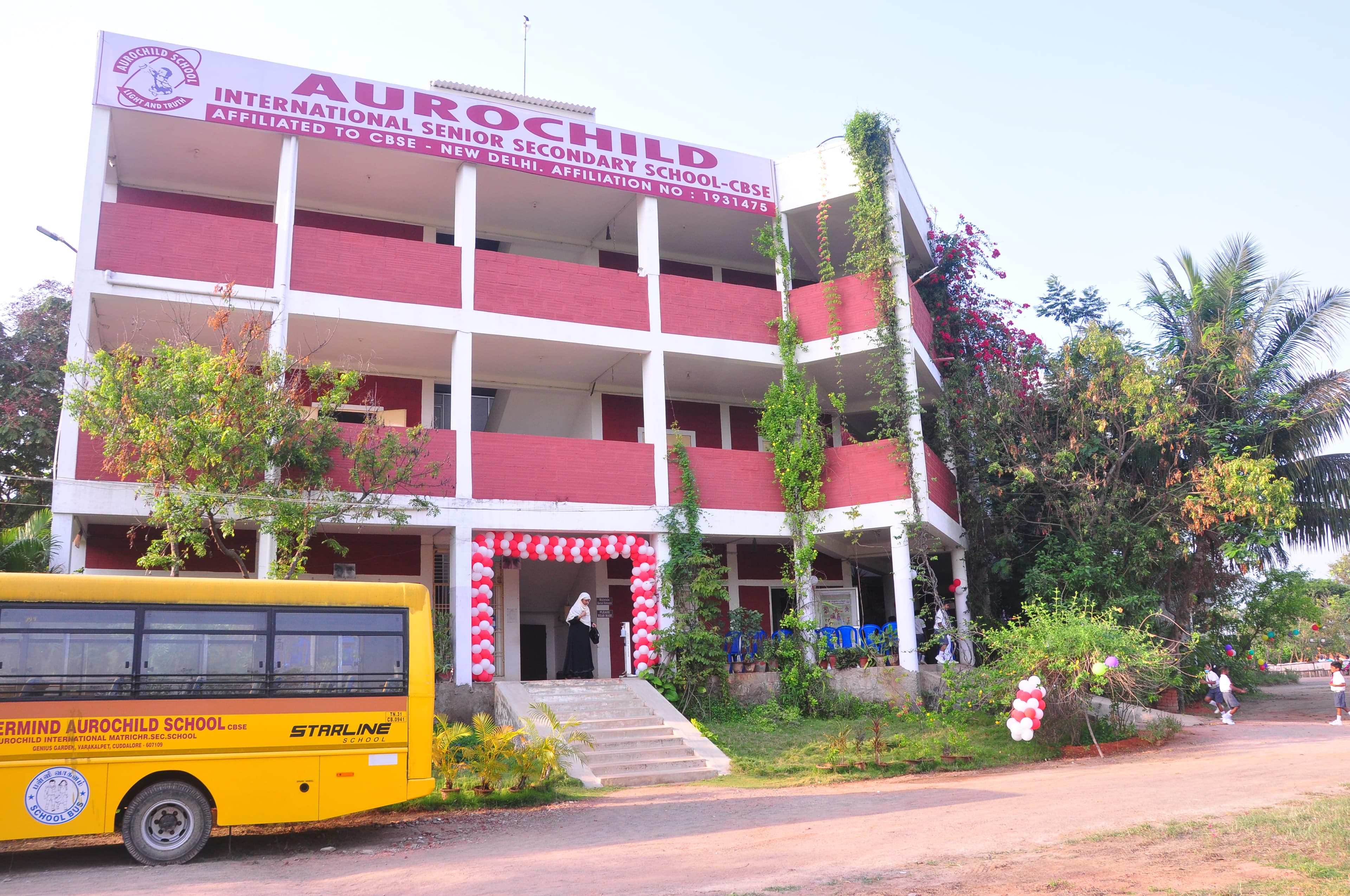 Aurochild campus building surrounded by greenery
