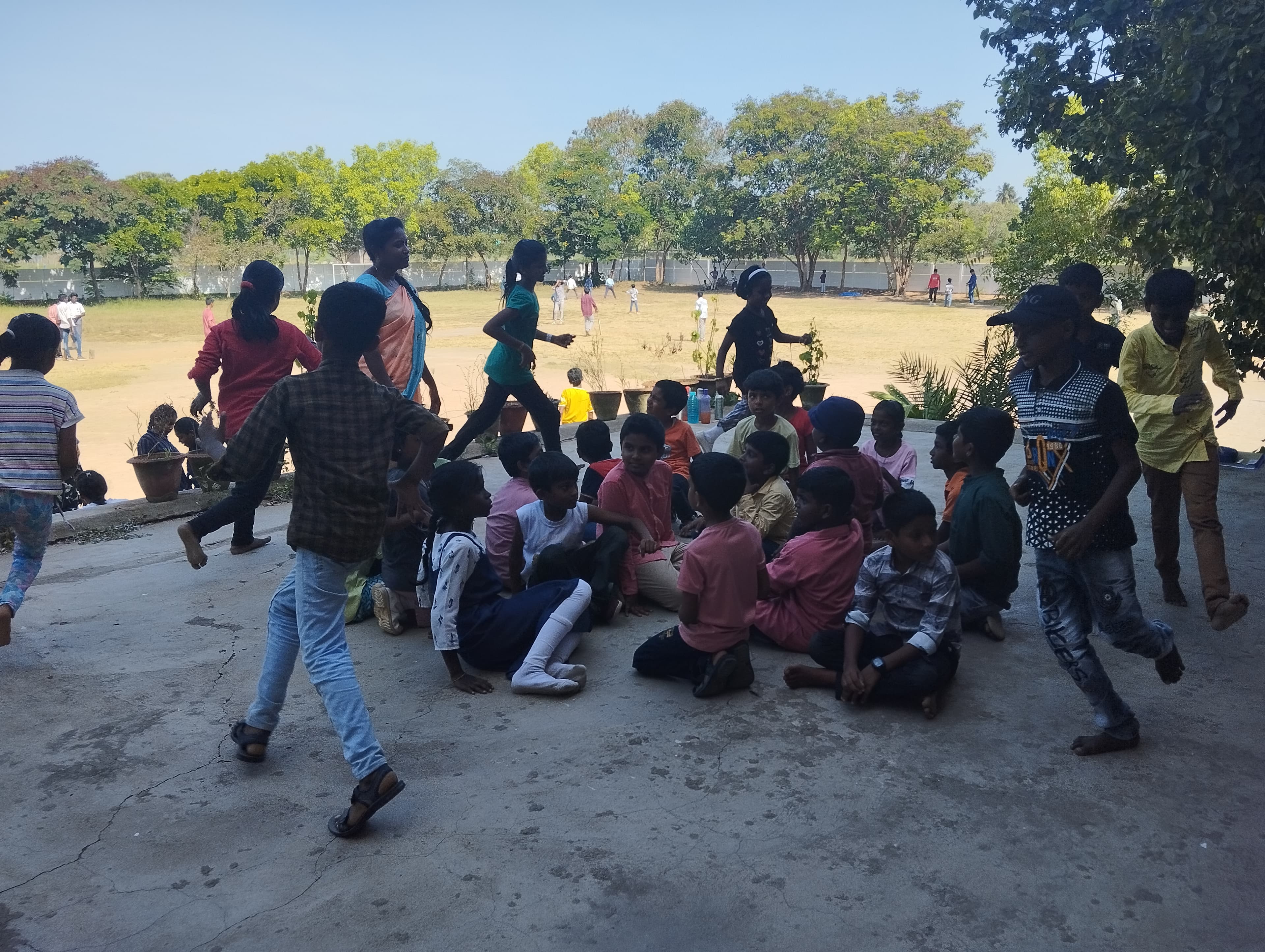 Aurochild students playing and collaborating outdoors