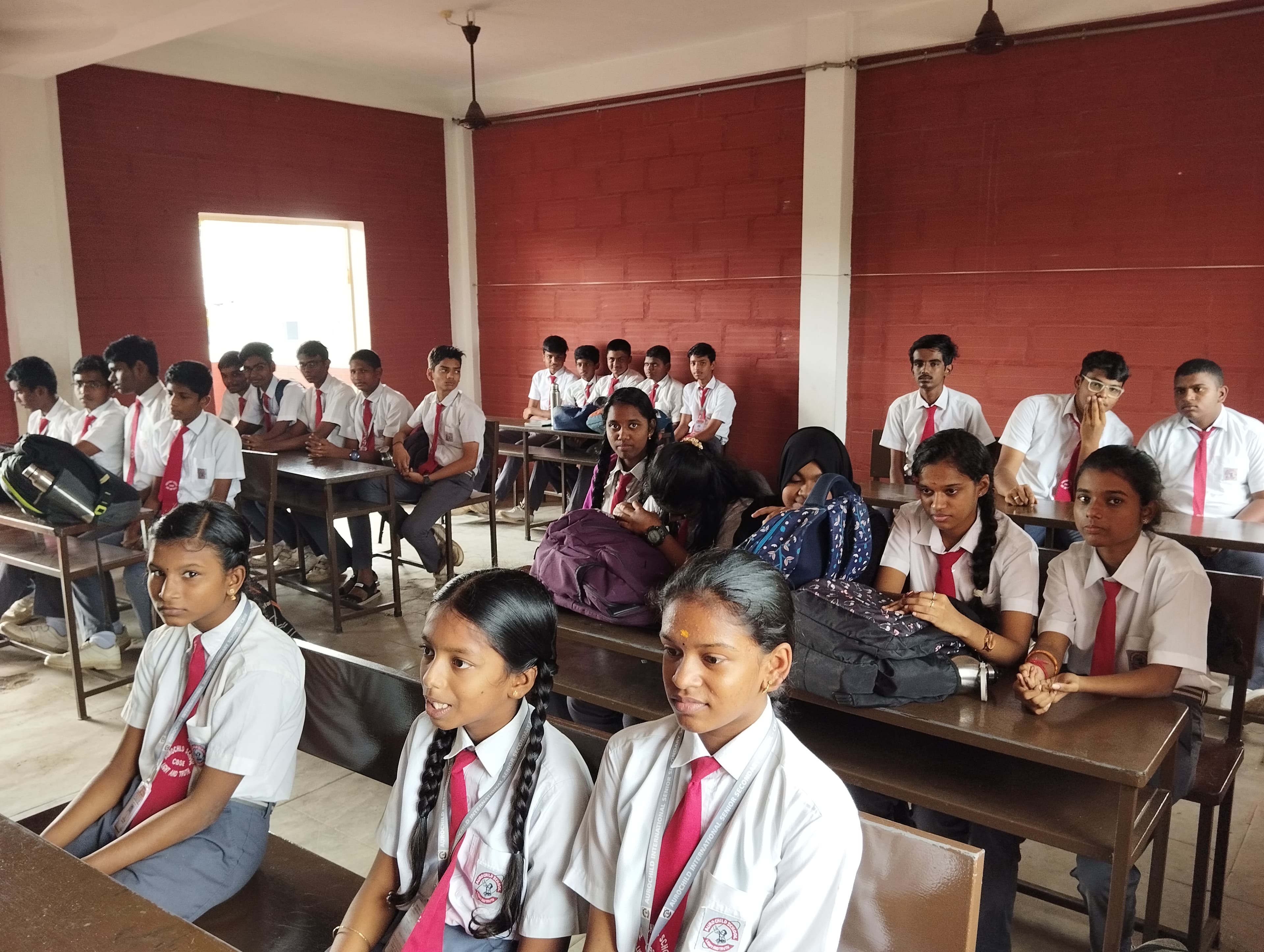 Students in a quiet, focused learning environment at Aurochild