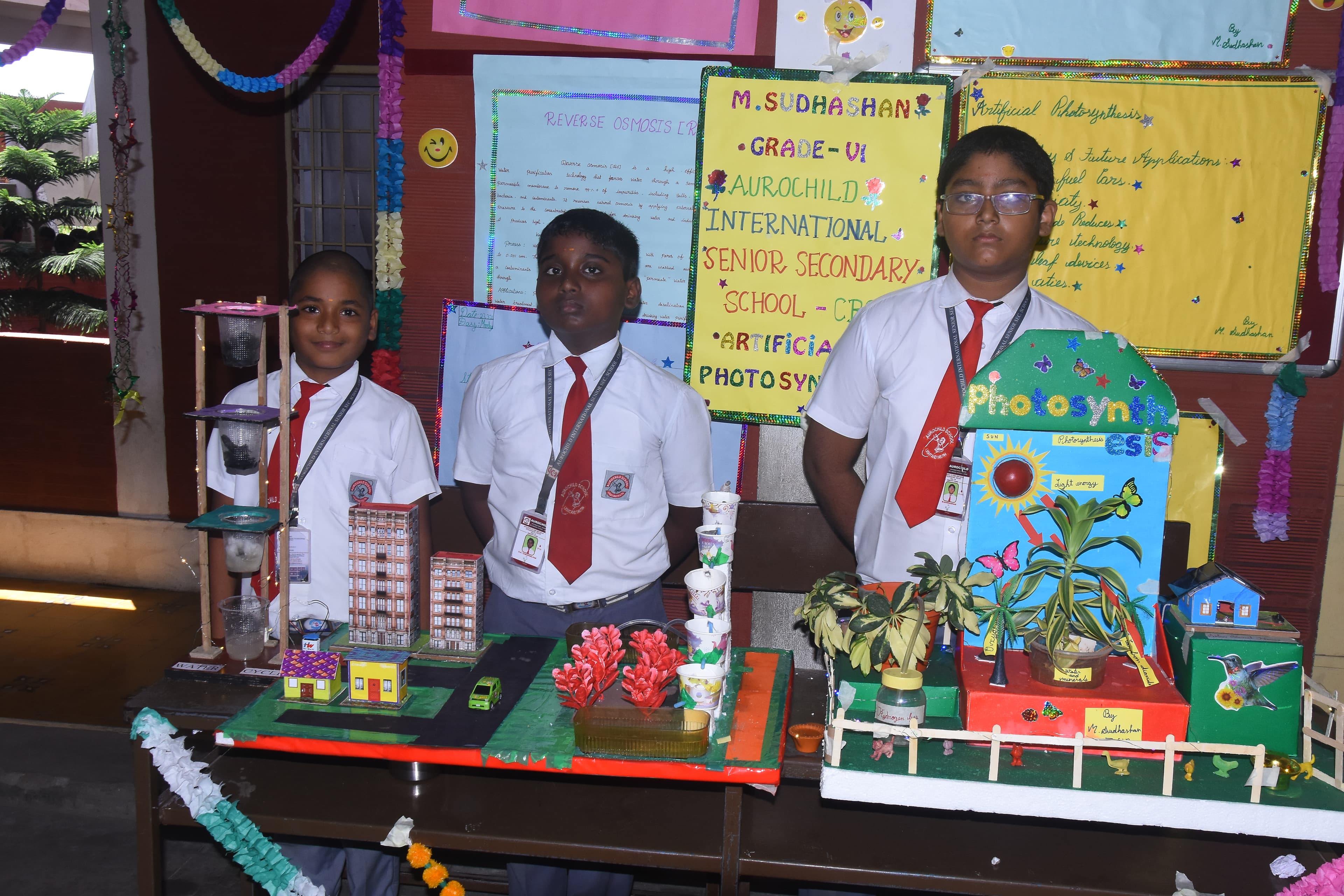 Students working on science projects at AuroSpark Exhibition