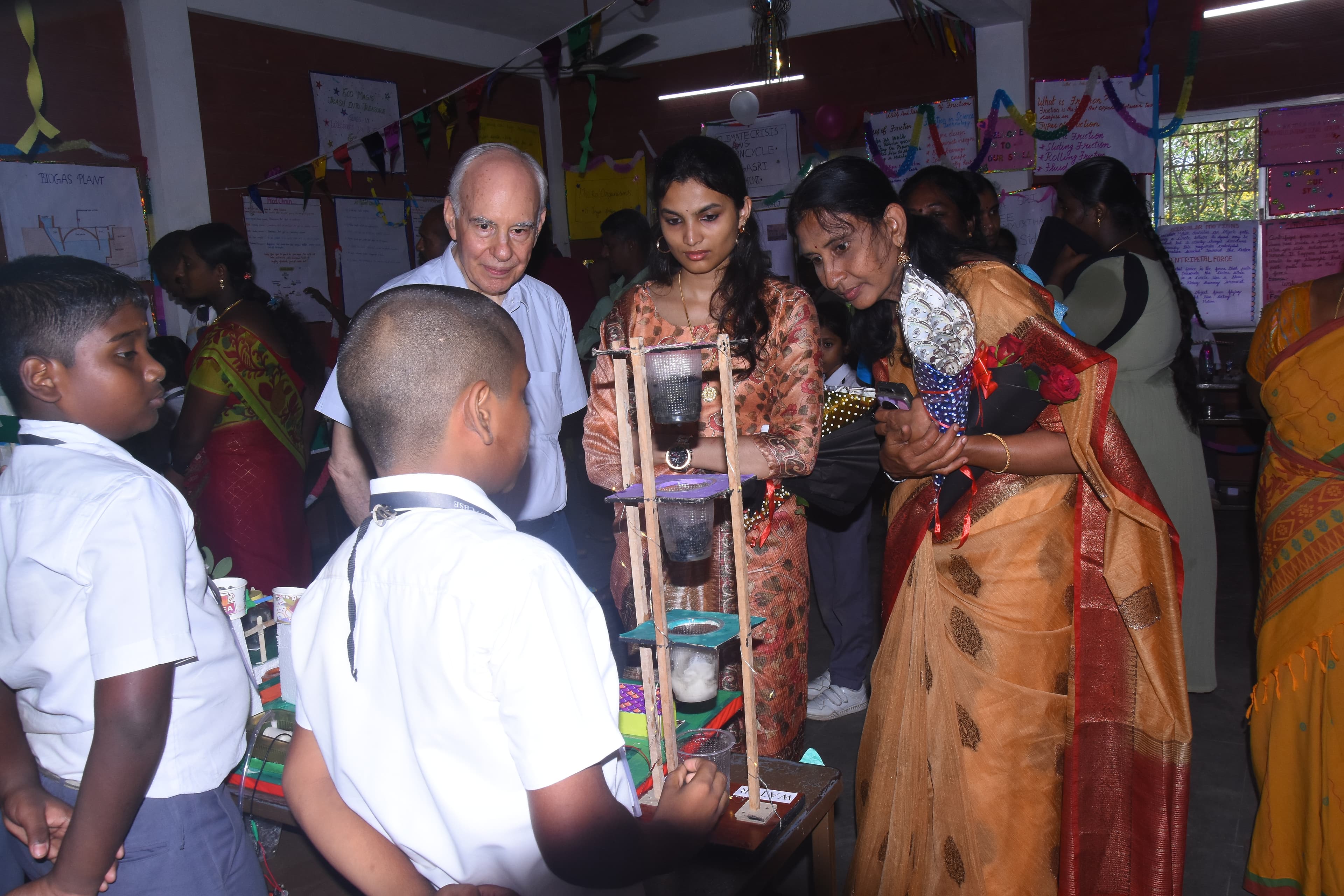 Students presenting science projects at AuroSpark Exhibition