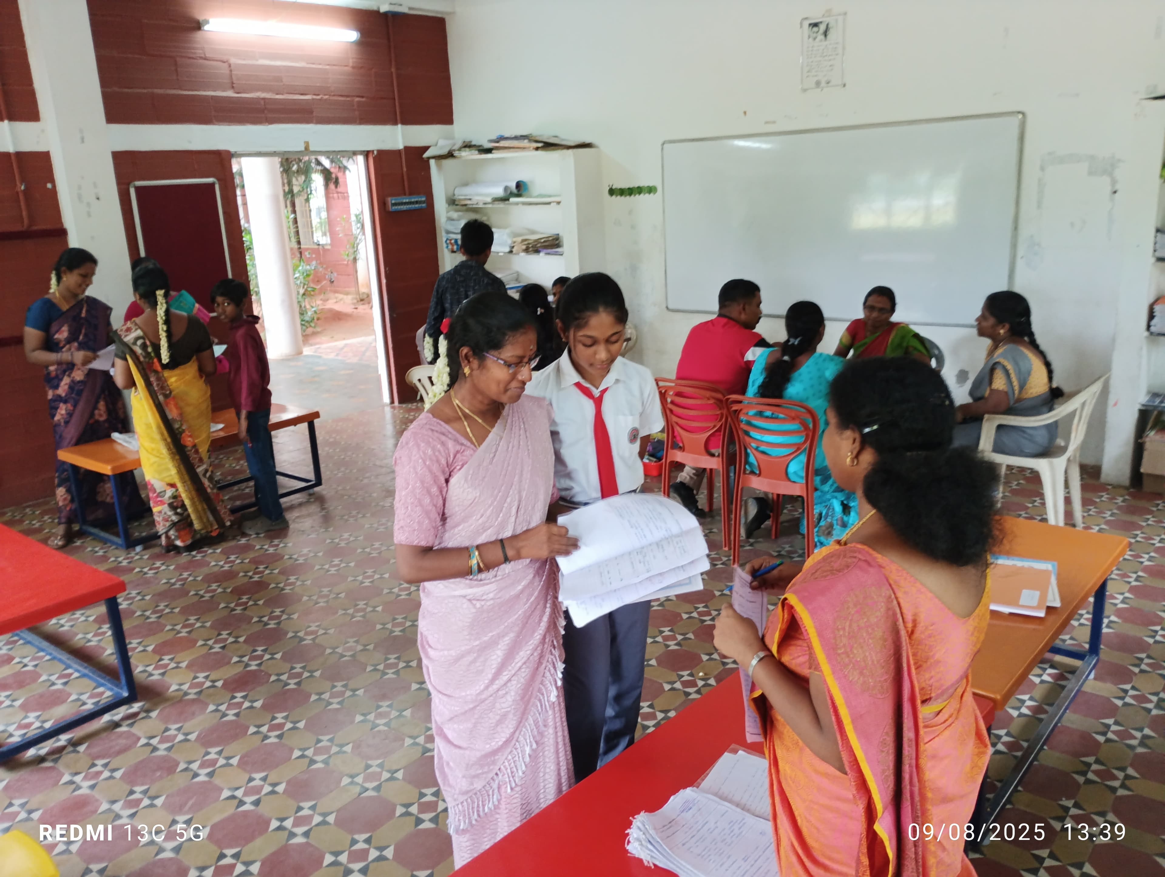 Mentor and family discussing higher education plans